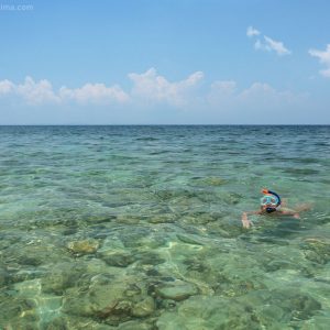 kids snorkeling in the sea on havelock island in andaman in india