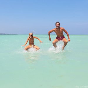 father and daughter in the sea on havelock island in andaman in india