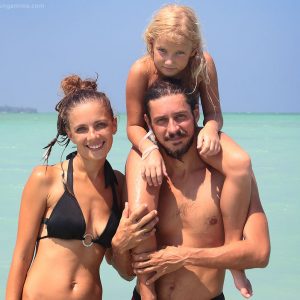 family portrait with daugther in the sea on havelock island in andaman in india