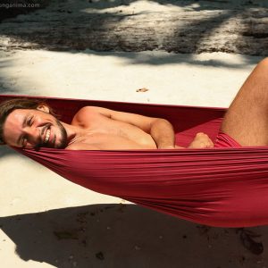 man in hammock on havelock island in andaman in india
